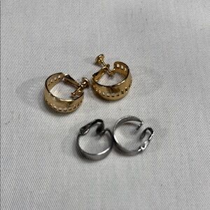Two pairs hoop clip on earrings.